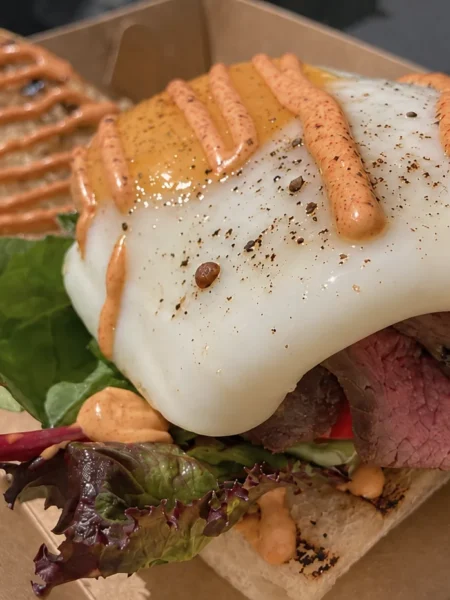Chivito, prepared and ready to serve.