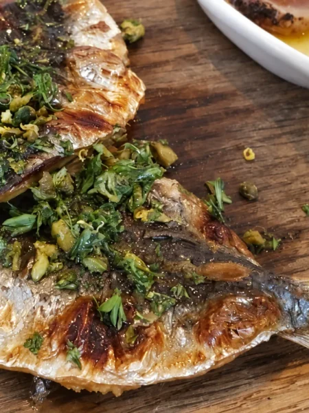 Flounder with Pistachio, Herb and Caper Sauce, prepared and ready to serve.