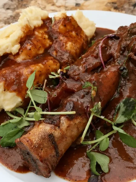 Minted Lamb Shanks, prepared and ready to serve.