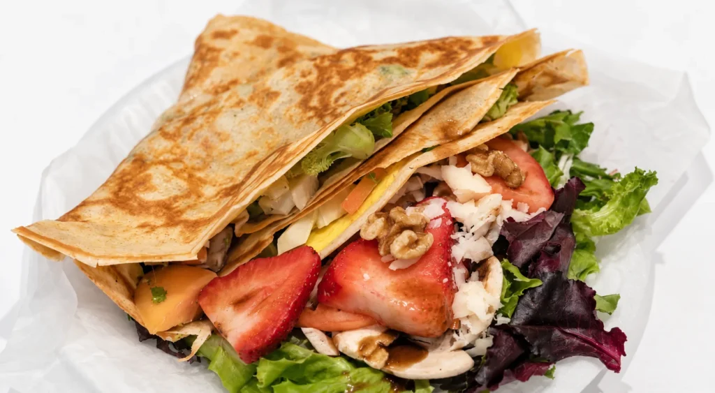 Savoury Crêpes with Mixed Salad, prepared and ready to serve.