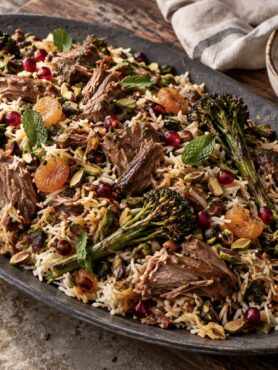 Persian fire lamb with jewelled rice, roasted Tenderstem broccoli, mint and rose harissa yogurt